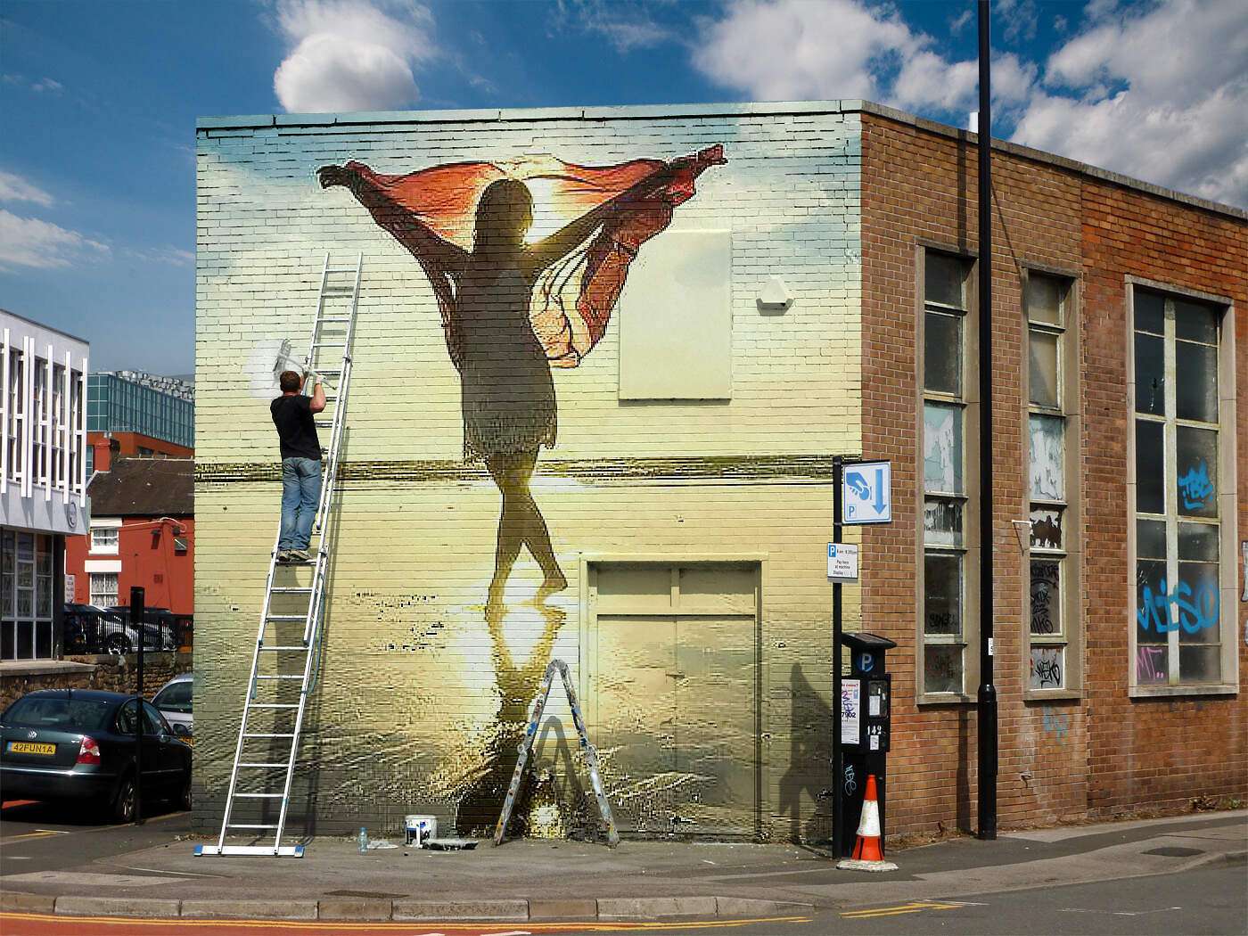 Wandbild mit einer Frau die Glücklich im Wind steht